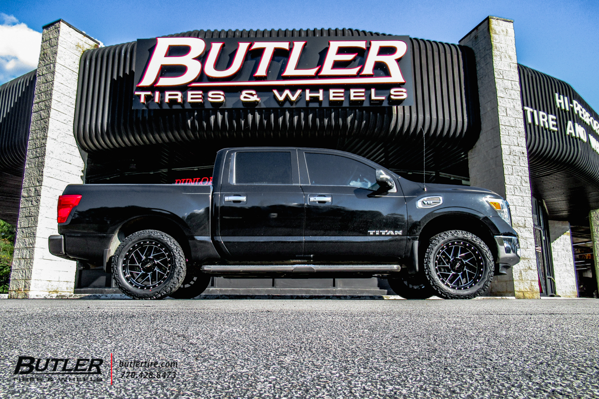 Nissan Titan with 20in Moto Metal M0985 Wheels and Venom Terra Hunter X/T Tires