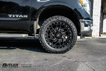 Nissan Titan with 20in Moto Metal M0985 Wheels and Venom Terra Hunter X/T Tires